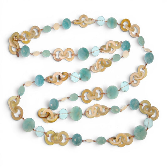Trebor Style long necklace featuring tan horn, turquoise chalcedony, crystal, and pearl beads on rose gold silver chain.