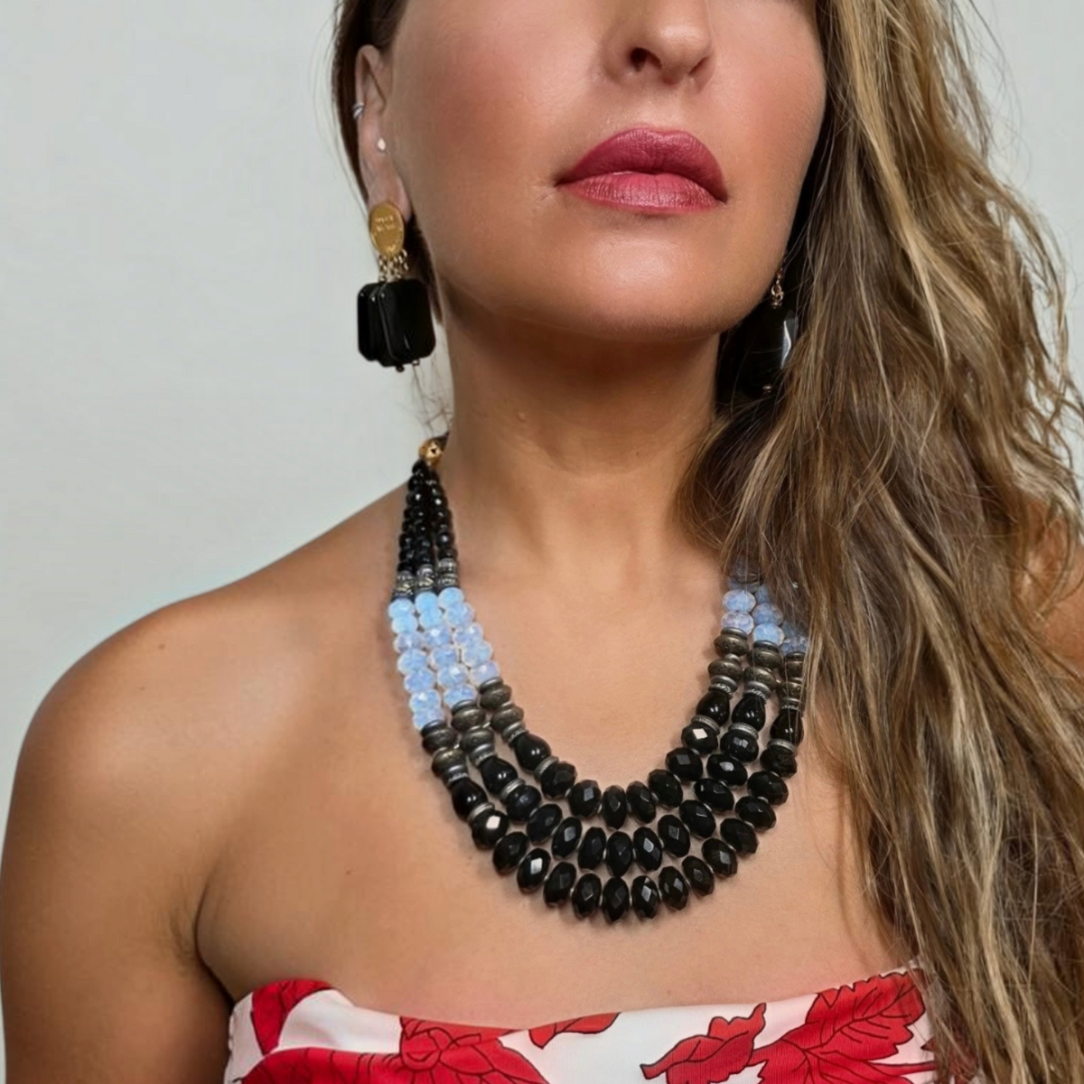 Trebor Style Masha Archer three-strand statement necklace with black onyx, opalite milkglass, and gold plated beads.