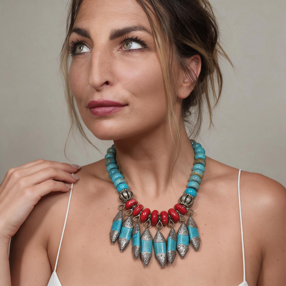 Trebor Style Masha Archer statement necklace with red baroque coral, turquoise rondelles, and Tibetan silver fringe.
