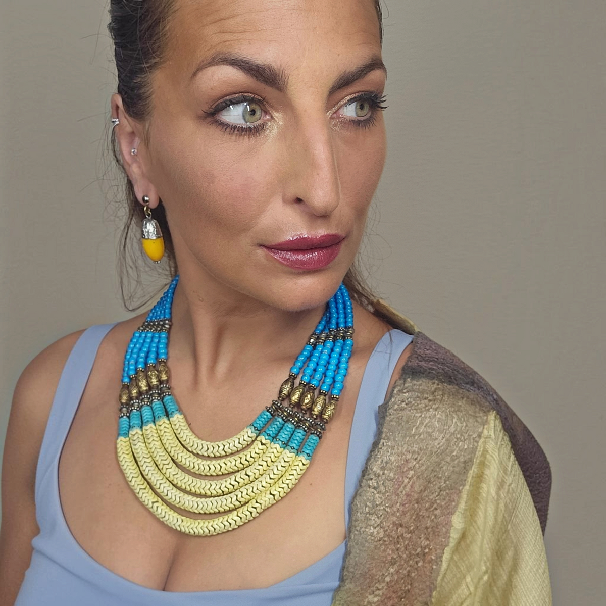 Trebor Style Masha Archer 5-strand statement necklace with yellow and blue glass snake beads and gold-washed spacers