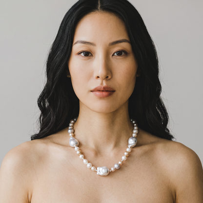 Trebor Style multi-color freshwater and baroque pearl necklace with 14k gold clasp worn by a woman