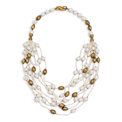 Trebor Style multi-strand necklace featuring white freshwater pearls, seed pearls, and 14k gold plated oval beads.