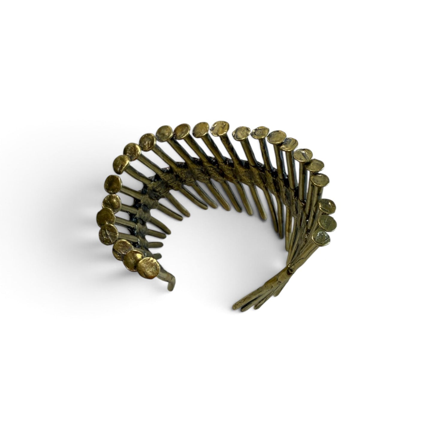 Trebor Style industrial cuff bracelet made from reclaimed copper and zinc nail gun nails with a raw metallic finish.