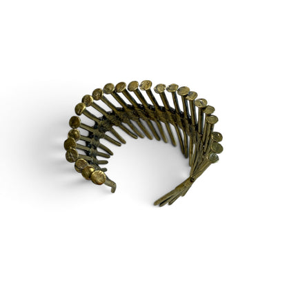 Trebor Style industrial cuff bracelet made from reclaimed copper and zinc nail gun nails with a raw metallic finish.