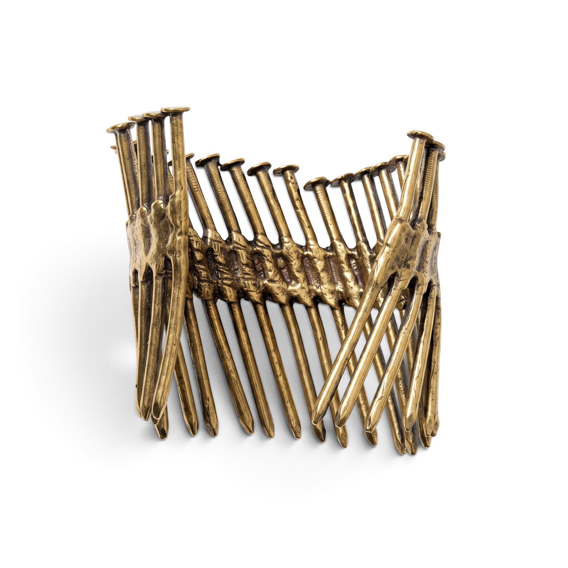 Trebor Style Nails Cuff made from reclaimed copper and zinc in an industrial, sculptural nail gun nail design.