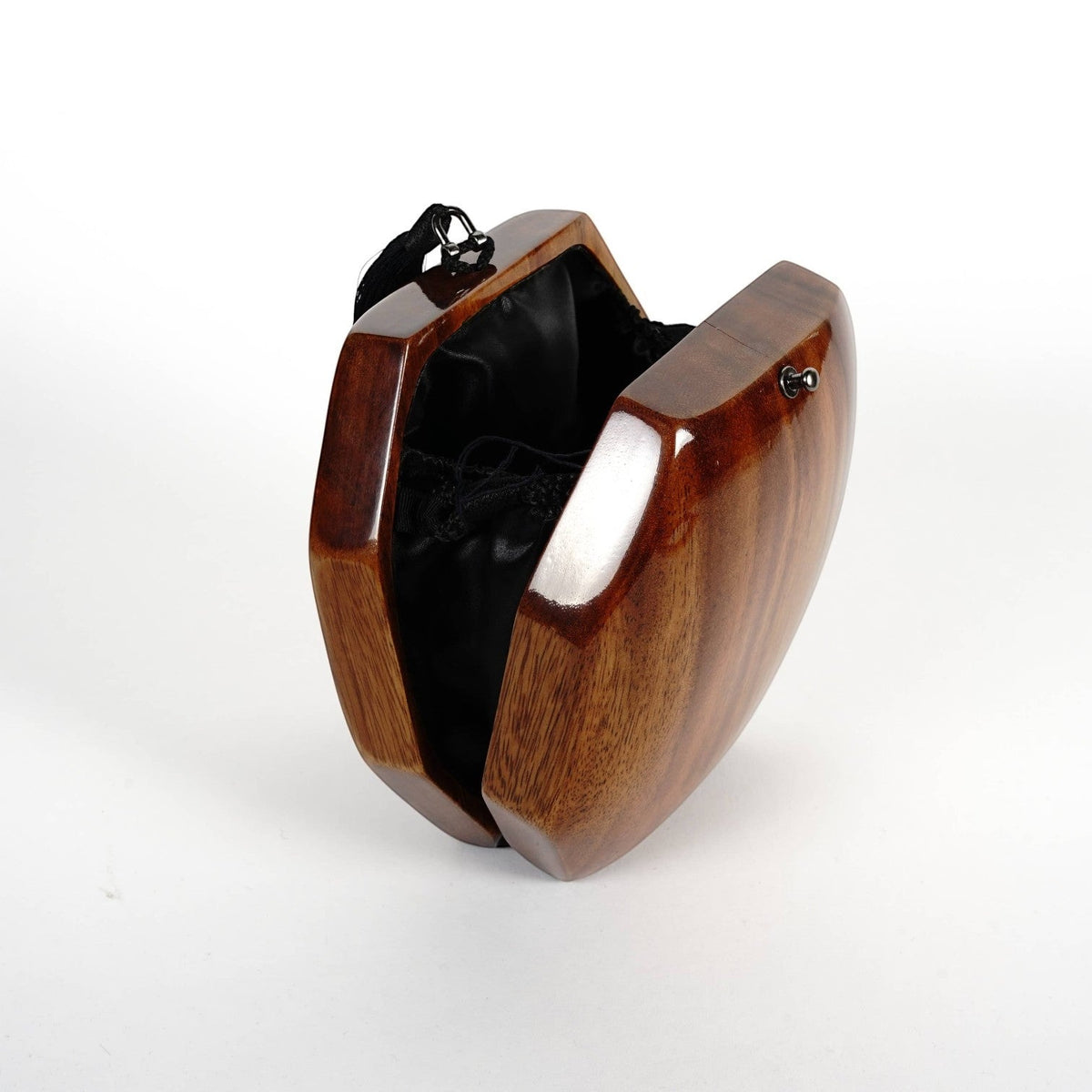 Trebor Style octagon handbag handcrafted from polished acacia wood with a black tassel and satin interior lining