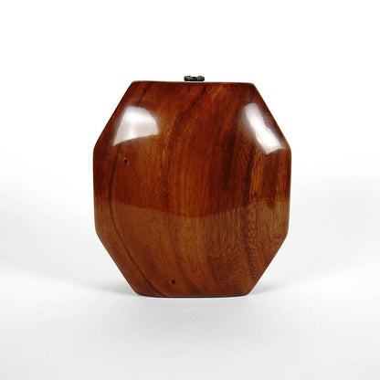 Trebor Style octagon handbag handcrafted from polished acacia wood with a natural finish and black tassel detail