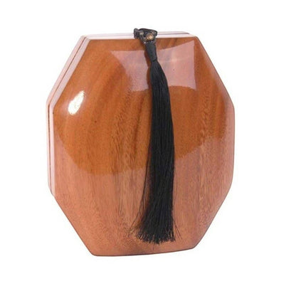 Trebor Style octagon handbag handcrafted from natural acacia wood with a decorative black tassel and cord strap.