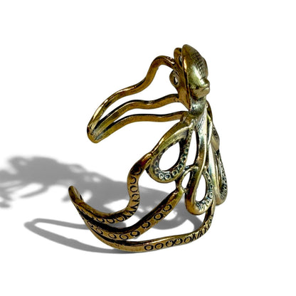 Trebor Style octopus cuff bracelet in antique brass featuring detailed tentacles wrapping around the wrist