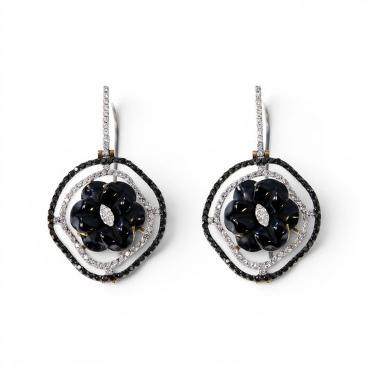 Trebor Style 18k gold drop earrings featuring a black onyx flower, pave white and black diamonds, and a keshi pearl.