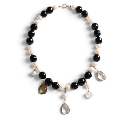 Trebor Style 18k gold necklace featuring black onyx beads, white pearls, and dangling quartz and pearl charm drops.