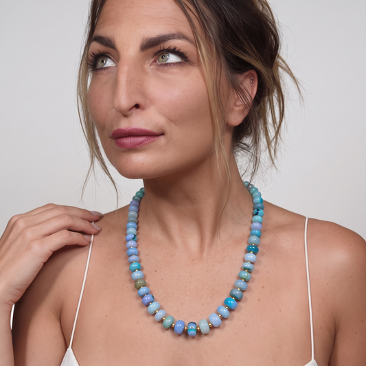 Trebor Style Spring Blues opal beaded necklace with 14k gold-dipped sterling silver accents worn by a woman