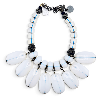 Trebor Style Masha Archer opalite milkglass fringe necklace with silver and brass floral accents and coin charm.