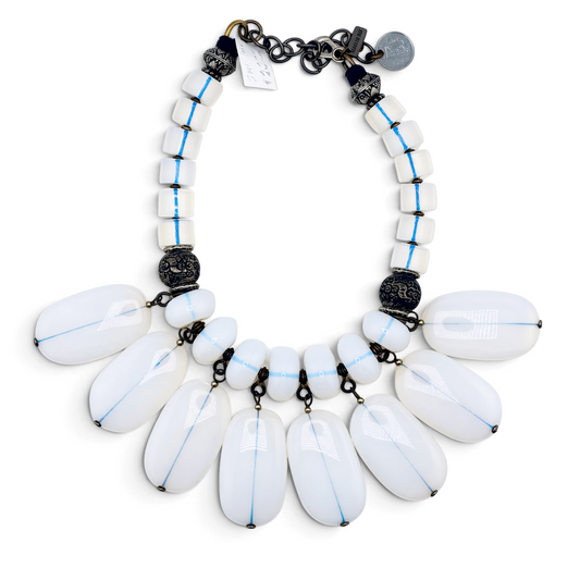 Trebor Style Masha Archer opalite milkglass fringe necklace with silver and brass floral accents and coin charm.