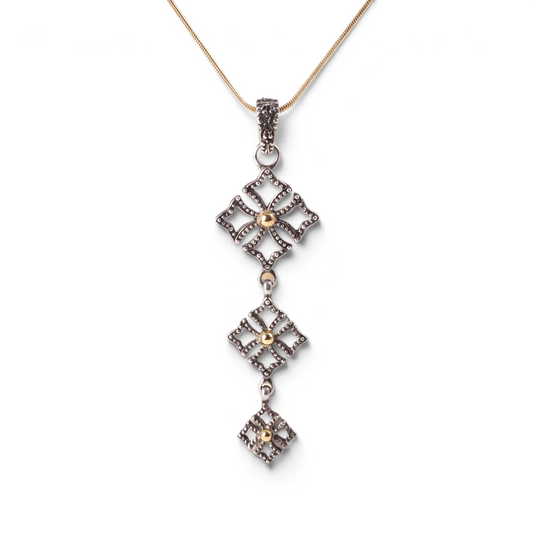 Trebor Style triple drop pendant necklace in oxidized sterling silver with 14k gold beads on an adjustable chain.