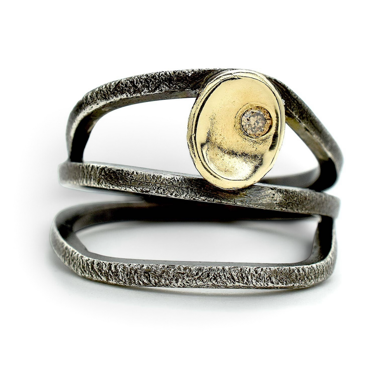 Trebor Style sterling silver wrap ring with textured oxidized finish, 14kt gold cup, and a cognac brown diamond.