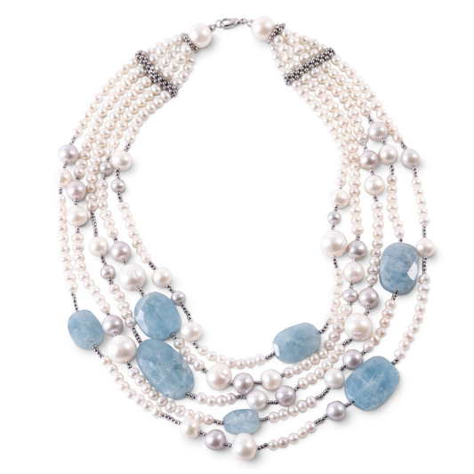 Trebor Style multi-strand necklace featuring white and gray freshwater pearls, aquamarine, and hematite in 18k gold.