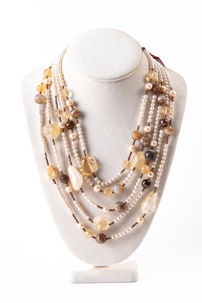 Trebor Style multi-strand necklace featuring cream freshwater pearls, brown agate, and golden citrine gemstones.