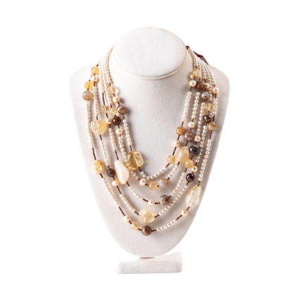 Trebor Style multi-strand necklace featuring cream pearls, brown agate, golden citrine, and hematite on 18k gold.