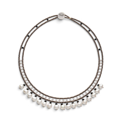 Trebor Style handmade necklace featuring white water pearls, black tourmaline, and Murano glass beads on steel wire.