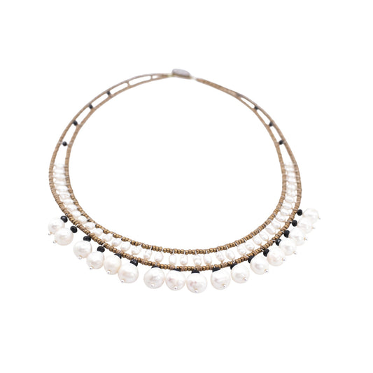 Trebor Style handmade necklace featuring white water pearls, black tourmaline, and Murano glass beads on steel wire.