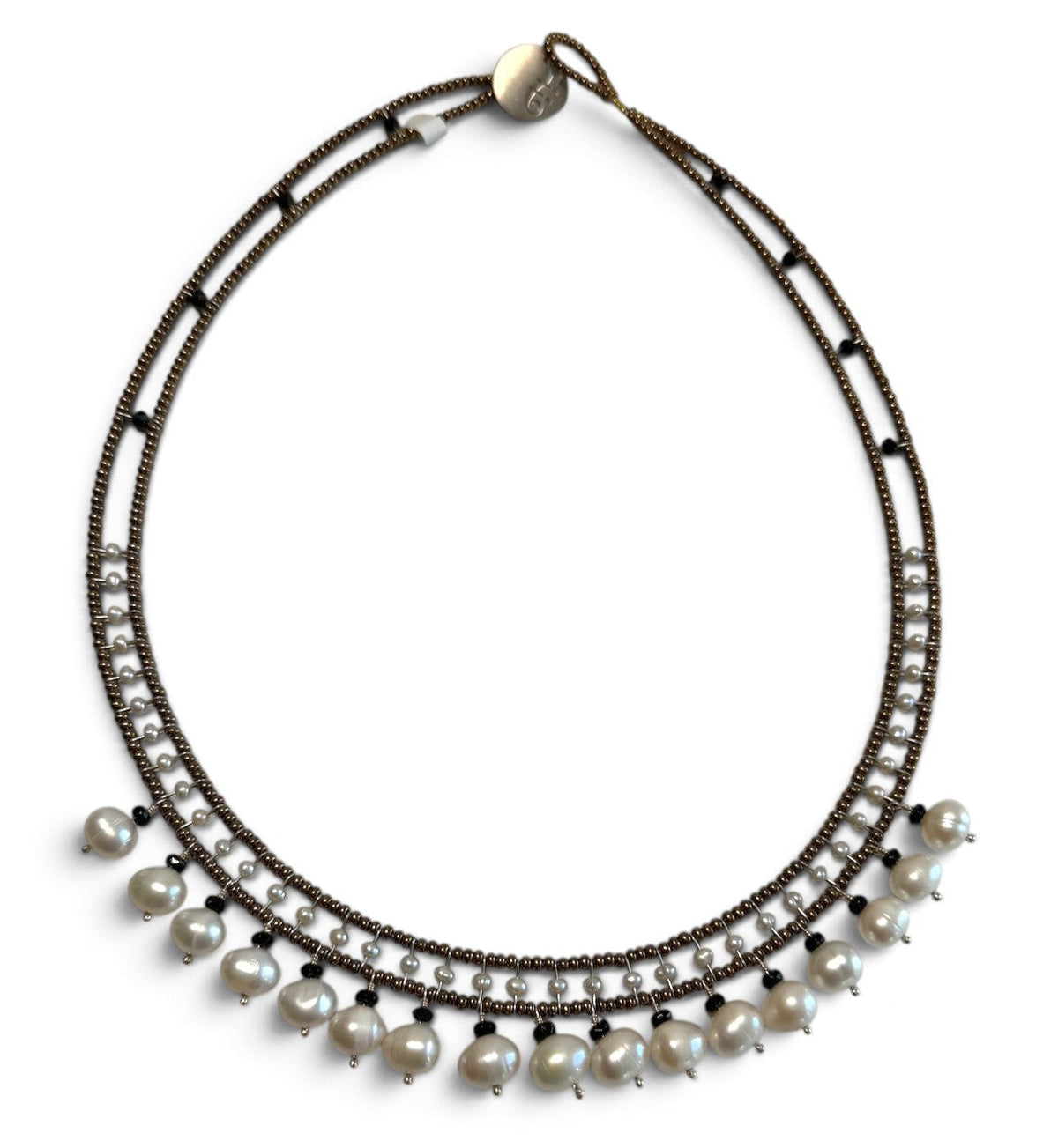 Trebor Style handmade necklace featuring white water pearls, black tourmaline, and Murano glass beads on steel wire.