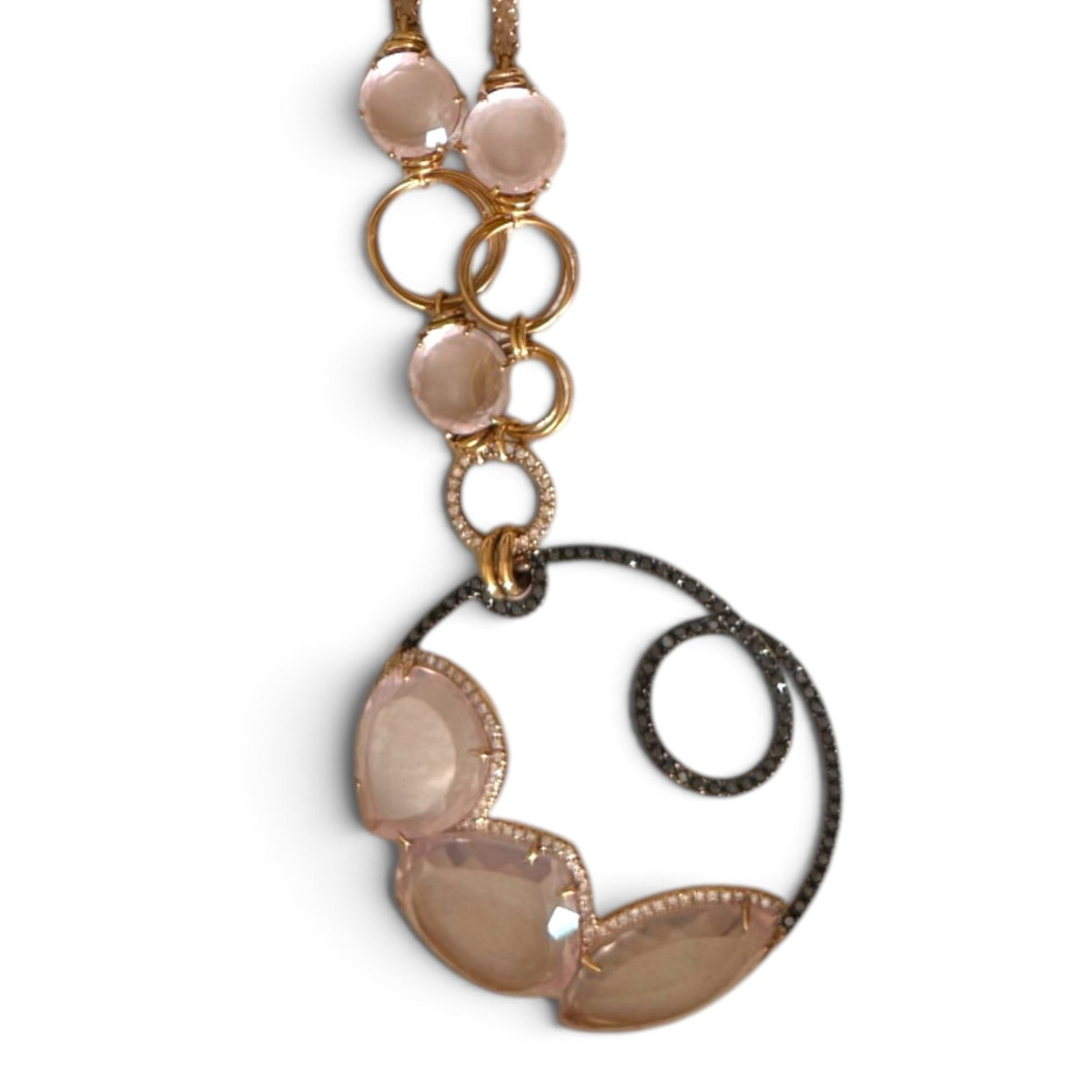 Trebor Style designer 18K gold necklace featuring pink quartz, white diamonds, and black diamond accents.
