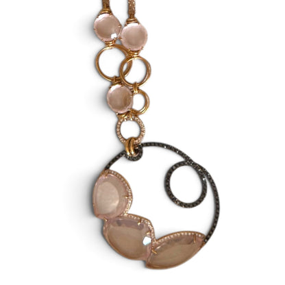 Trebor Style designer 18K gold necklace featuring pink quartz, white diamonds, and black diamond accents.
