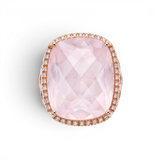 Trebor Style cushion-cut pink quartz cocktail ring in 18k rose gold with a diamond halo setting.