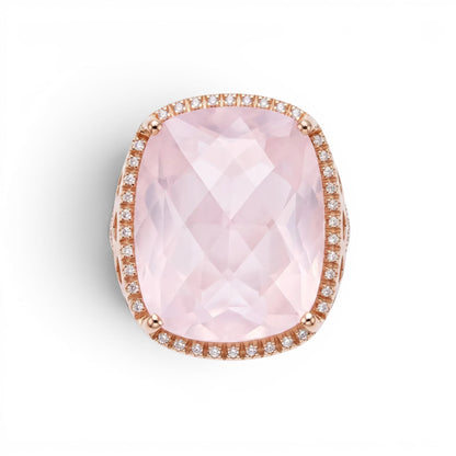 Trebor Style cushion-cut pink quartz cocktail ring in 18k rose gold with a diamond halo setting.
