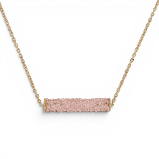 Trebor Style gold plated necklace featuring a delicate bar pendant with pink Swarovski crystals on a fine chain.