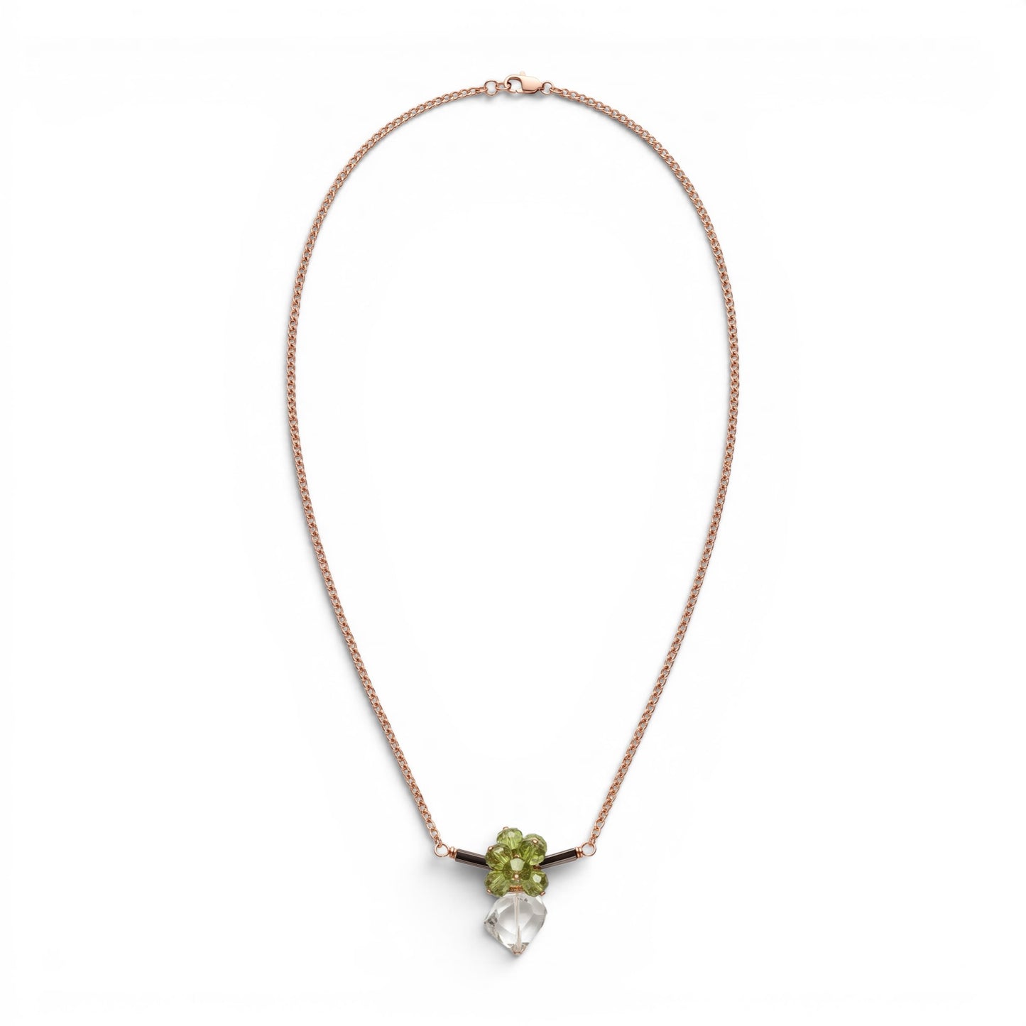 Trebor Style bar necklace featuring green peridot, dark tourmaline, and a praisiolite pendant on a gold wheat chain.