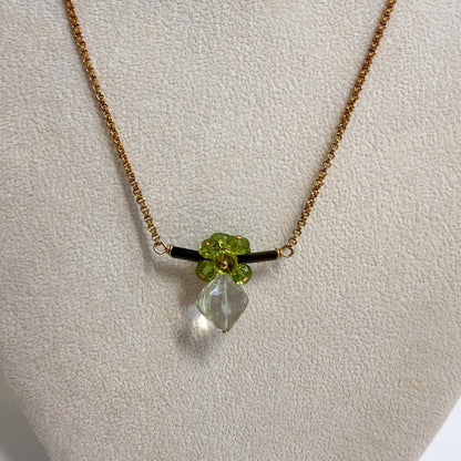 Trebor Style bar necklace featuring a dark green tourmaline bar, peridot cluster, and a dangling praisiolite pendant.