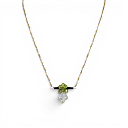 Trebor Style bar necklace featuring green peridot, dark tourmaline, and a praisiolite drop on a gold filled chain.