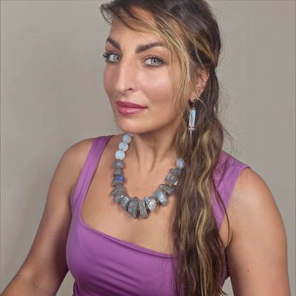 Trebor Style Masha Archer wreath necklace with grey pyrite nuggets and white opalite beads worn by a woman