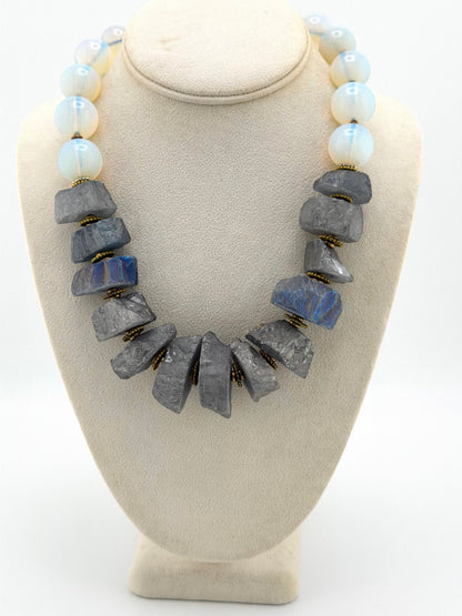 Trebor Style Masha Archer wreath necklace featuring grey pyrite nuggets and white opalite beads on a display bust