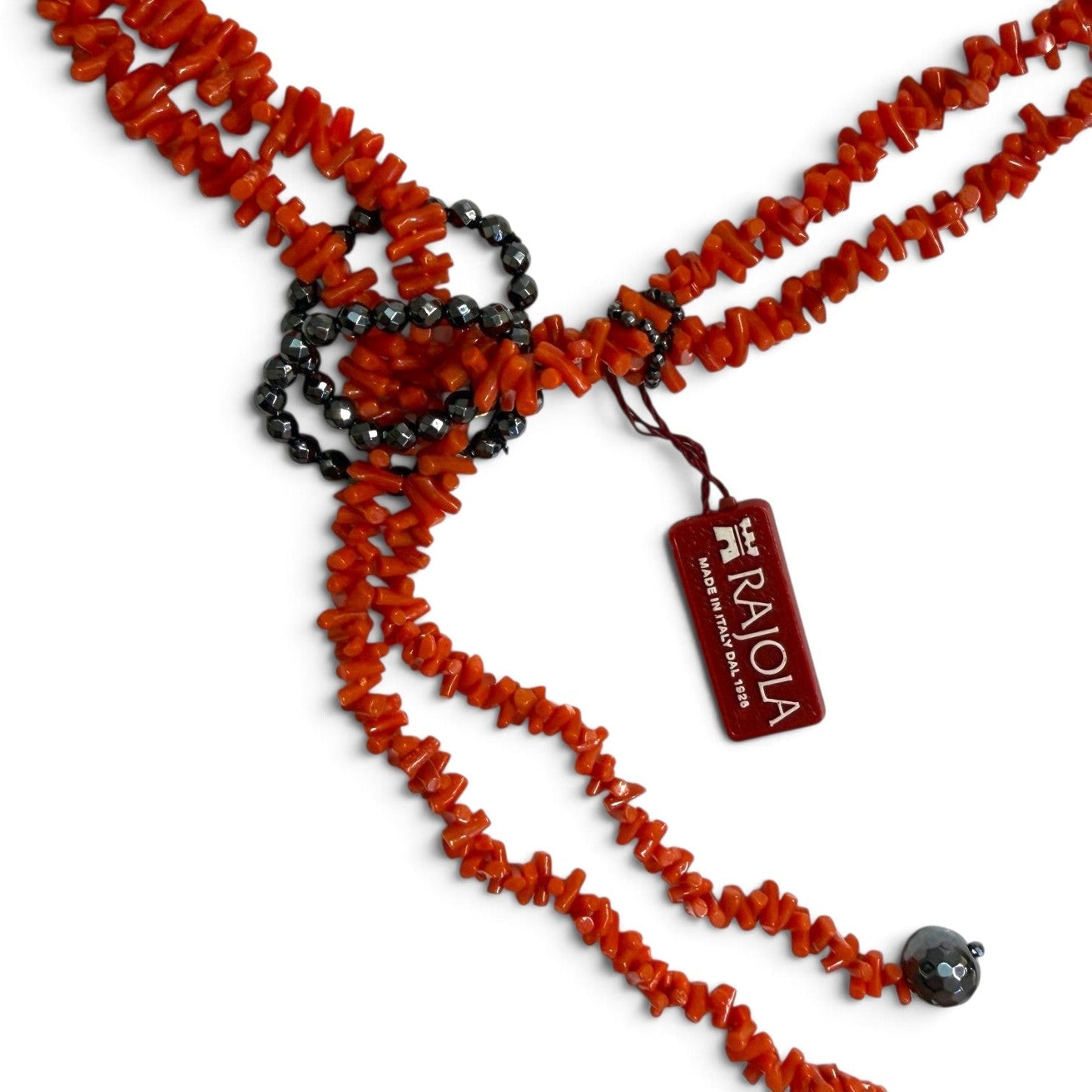 Trebor Style RAJOLA multi-strand necklace featuring natural red coral chips and dark faceted hematite beads.