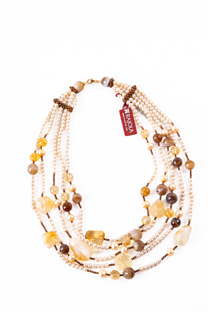 Trebor Style Rajola multi-strand necklace featuring cream freshwater pearls, brown agate, and golden citrine gemstones.