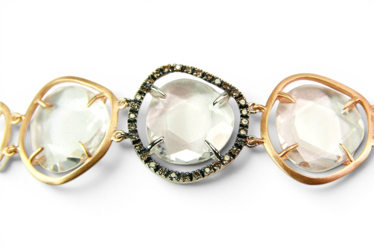 Trebor Style tennis bracelet featuring cushion cut rock crystal in brushed 18k rose gold with black diamond accents.