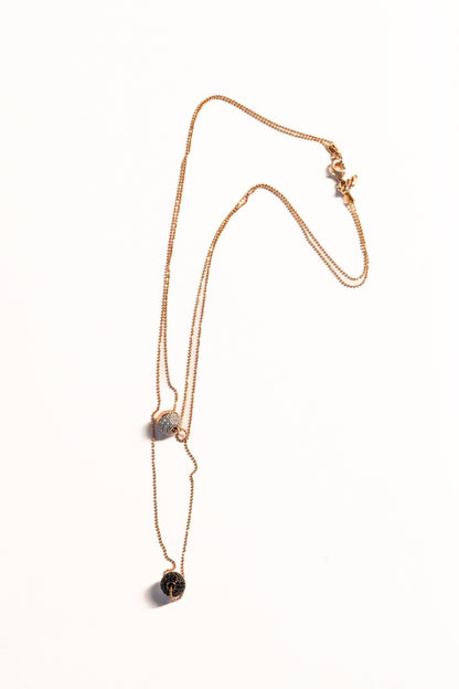Trebor Style Bronzallure double-strand rose gold necklace with white cubic zirconia and black spinel sphere pendants.