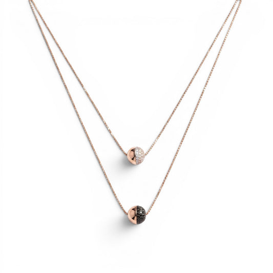 Trebor Style Bronzallure double-strand rose gold necklace with a white cubic zirconia sphere and a black spinel sphere.