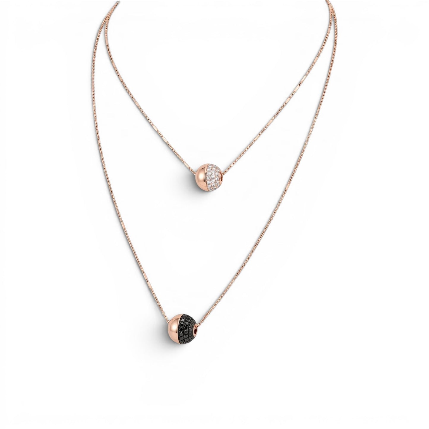 Trebor Style rose gold plated double-strand necklace with white and black spineli gemstone sphere pendants on a delicate chain, handmade in Italy by Bronzallure