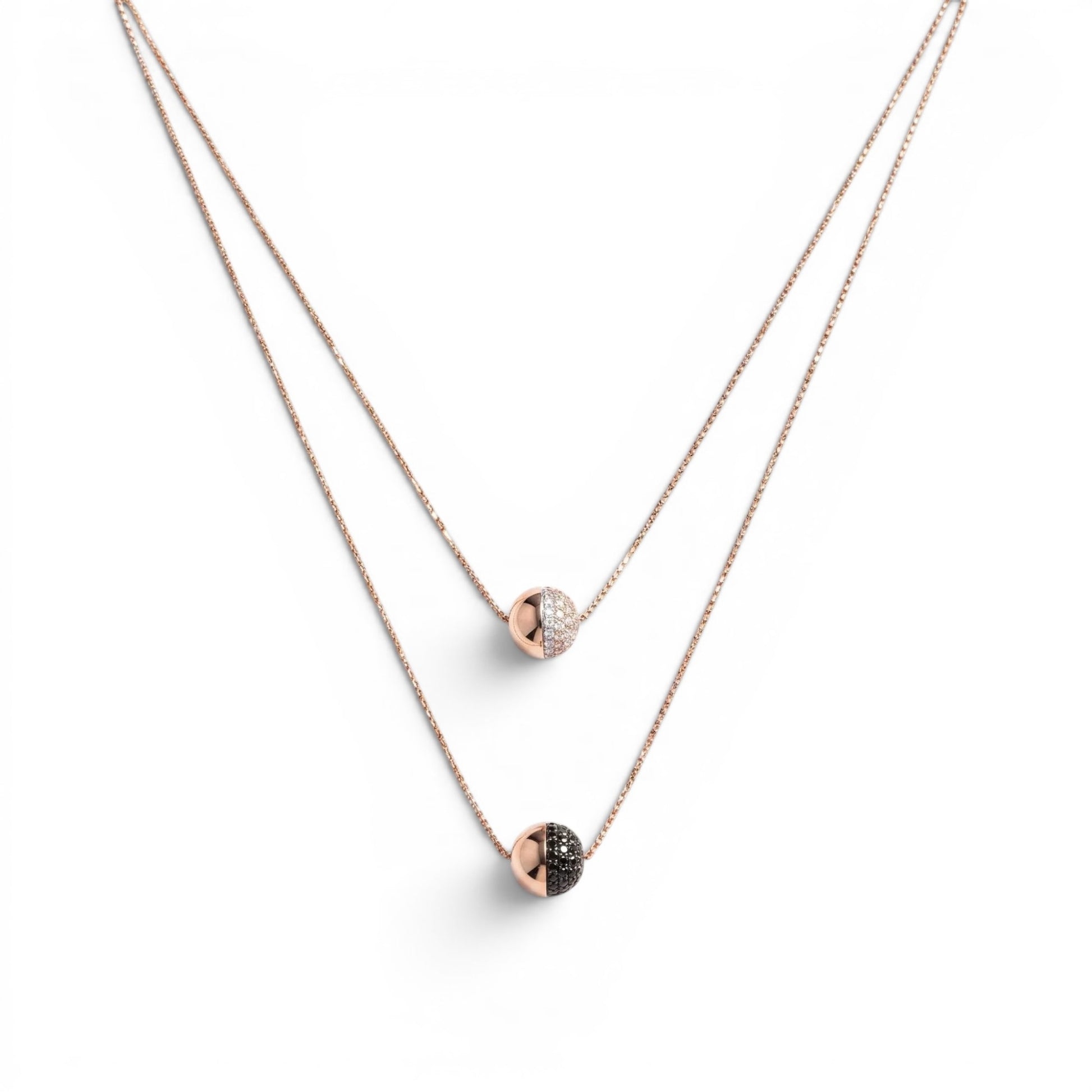 Trebor Style rose gold plated double-strand necklace with white and black spineli gemstone sphere pendants on a delicate chain, handmade in Italy by Bronzallure