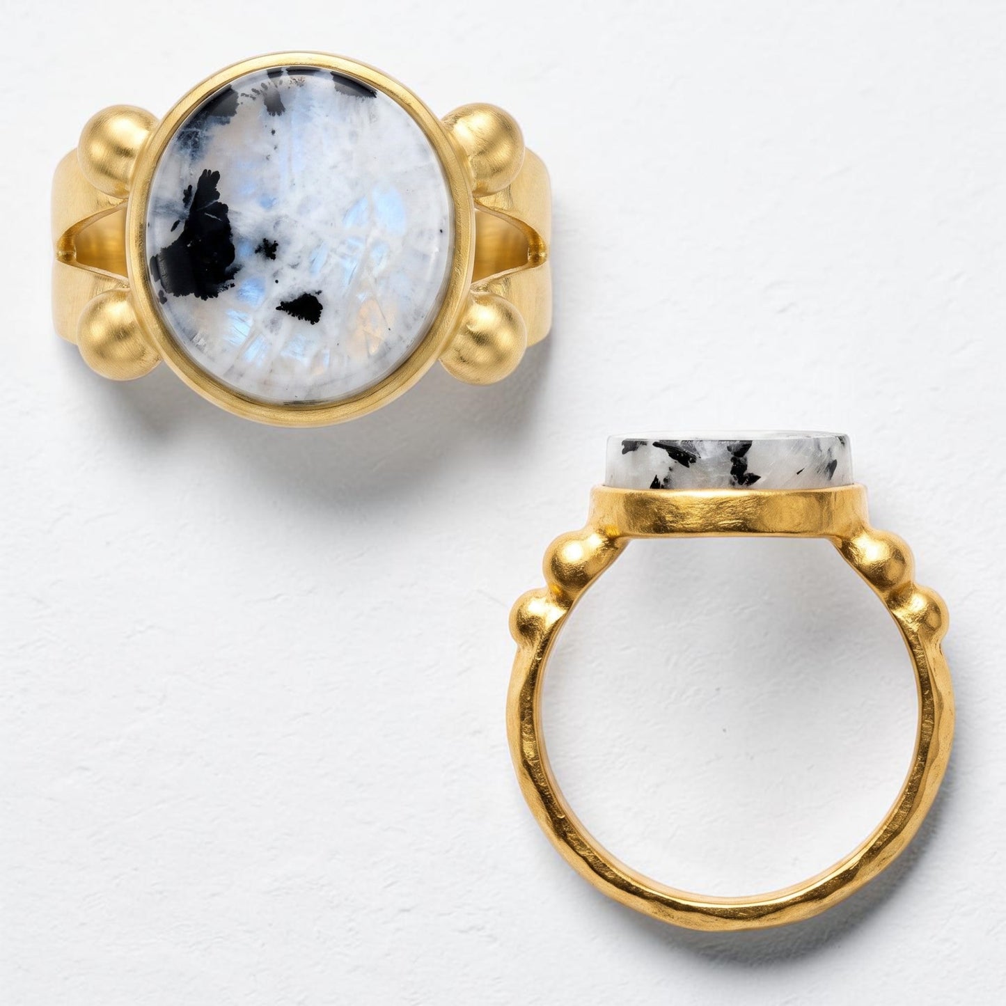 Trebor Style 16mm round-cut moonstone ring with a chunky gold-filled adjustable band and iridescent stone details.