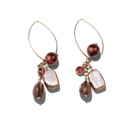 Trebor Style chandelier earrings featuring ruby, white keshi pearl, smokey quartz, and red tiger-eye on gold hooks.