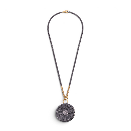 Trebor Style two-tone sand dollar pendant necklace in oxidized sterling silver and 14k gold with white sapphires.