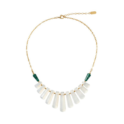 Trebor Style selenite goddess statement necklace with turquoise beads and brass barley chain on white background