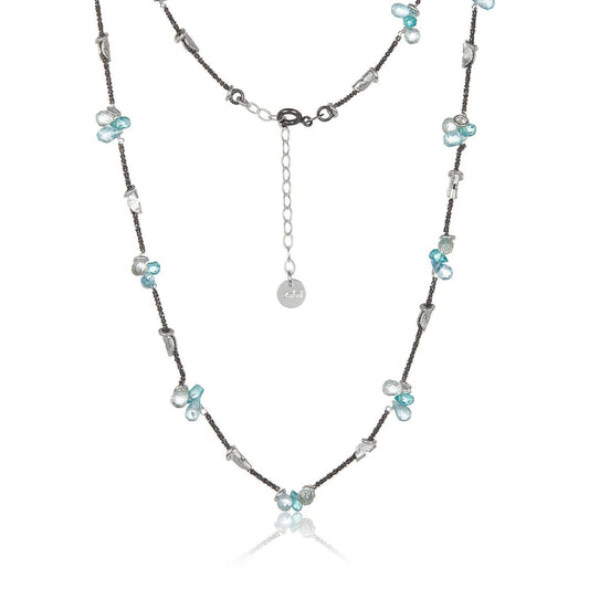 Trebor Style silver half moon necklace featuring blue topaz teardrop clusters on an oxidized sterling silver chain.