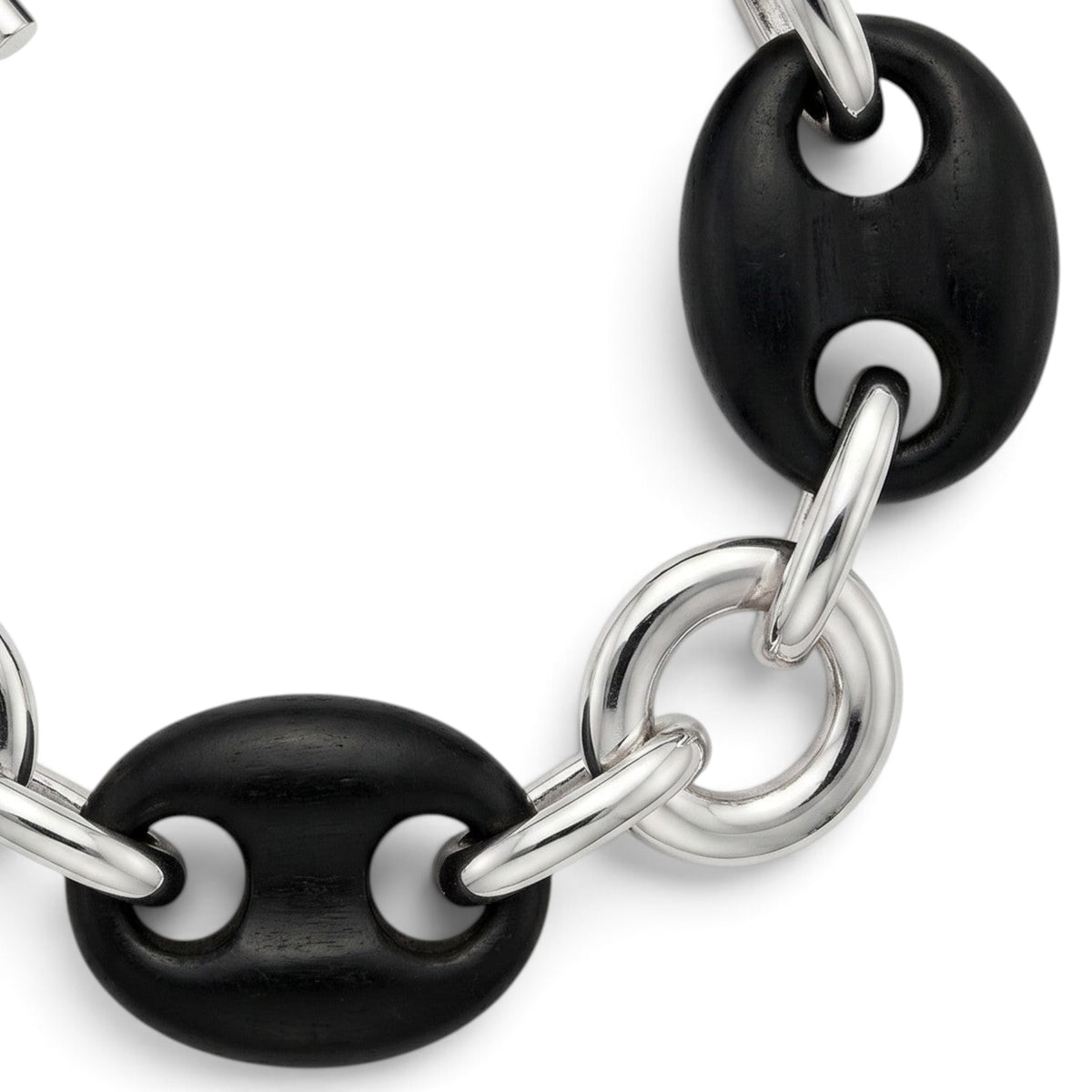 Trebor Style sterling silver and black ebony wood link bracelet with a toggle clasp on a white background.