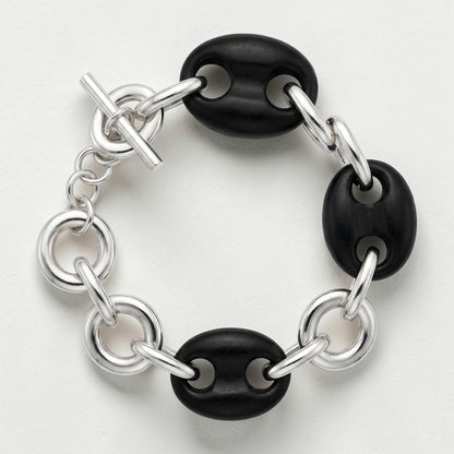 Trebor Style sterling silver and black ebony link bracelet with a toggle clasp, featuring hand-carved wood links.